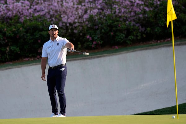 Bryson DeChambeau reacts after missing a putt on the 13th hole during the third round at the Masters golf tournament, Saturday, April 12, 2025, in Augusta, Ga. (AP Photo/David J. Phillip)