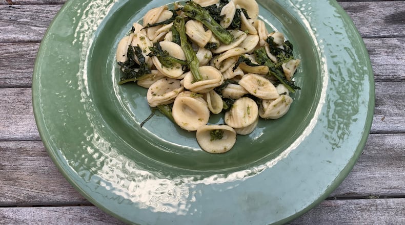The key to making Orecchiette with Rapini and Anchovies is getting the bitterness of the rapini in check. (John Kessler for The Atlanta Journal-Constitution)