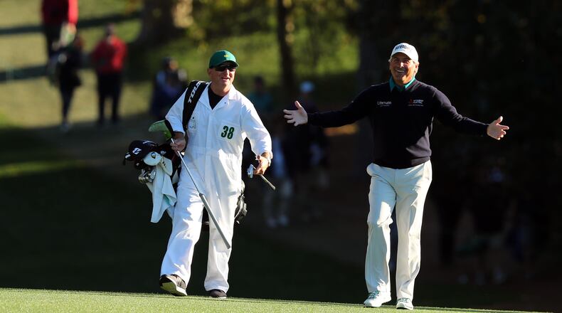 Fred Couples exults over hitting it close on No. 18 Friday at the Masters. His birdie there completed a second-round 70. (Curtis Compton/ccompton@ajc.com)