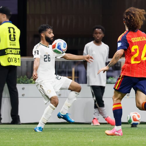 Saudi Arabia's Mohammed Abu Alshamat (left) controls the ball against Spain's Marc Cucurella during second half of the Spain vs. Saudia Arabia World Cup match at Atlanta Stadium on Sunday, June 21, 2026. (Miguel Martinez/AJC)
