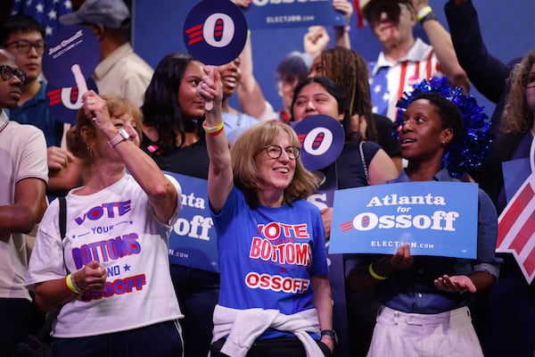 Supporters wear a “Vote Your Bottoms and Ossoff” shirts at a campaign rally for Democratic candidate for governor Keisha Lance Bottoms and U.S. Sen. Jon Ossoff at the Tabernacle in Atlanta on May 31, 2026. (Arvin Temkar/AJC)