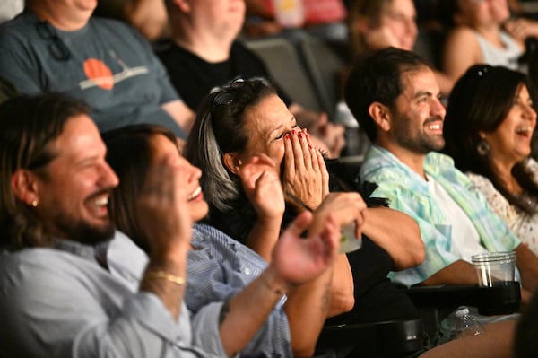 Audience members enjoy the laughs during the “Dirty 30” celebration at Dad’s Garage on Friday, July 25, 2025, in Atlanta. (Hyosub Shin/AJC)