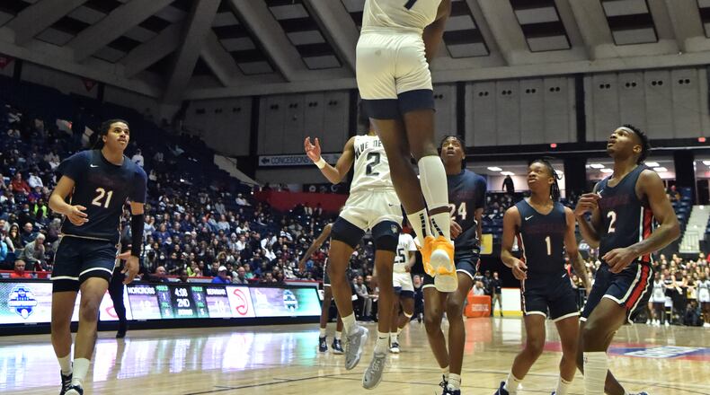 March 12, 2022 Macon - Norcross' Samarion Bond (4) goes to the basket for the shot during the 2022 GHSA State Basketball Class AAAAAAA Boys Championship game at the Macon Centreplex in Macon on Saturday, March 12, 2022. (Hyosub Shin / Hyosub.Shin@ajc.com)