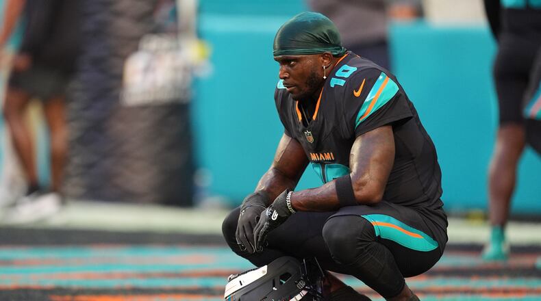 FILE - Miami Dolphins wide receiver Tyreek Hill sits in the end zone before an NFL football game against the New York Jets, Sept. 29, 2025, in Miami Gardens, Fla. (AP Photo/Rebecca Blackwell, File)