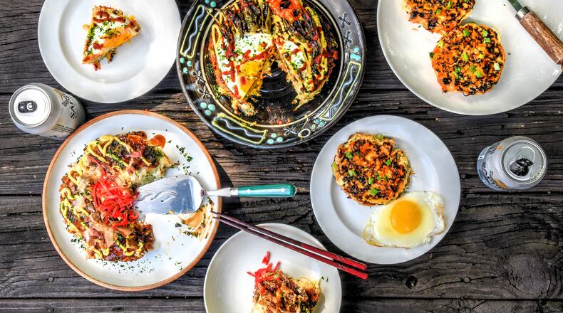 You can make okonomiyaki, the classic Japanese cabbage pancake, at home. We're giving you three versions: Vegetarian Okonomiyaki (top center large plate, with serving at left), Okonomiyaki with Shrimp (top right large plate, with serving below it) and Classic Okonomiyaki with Pork Belly (lower left large plate, with serving center bottom). Food styling by Wendell Brock / Chris Hunt /For The AJC