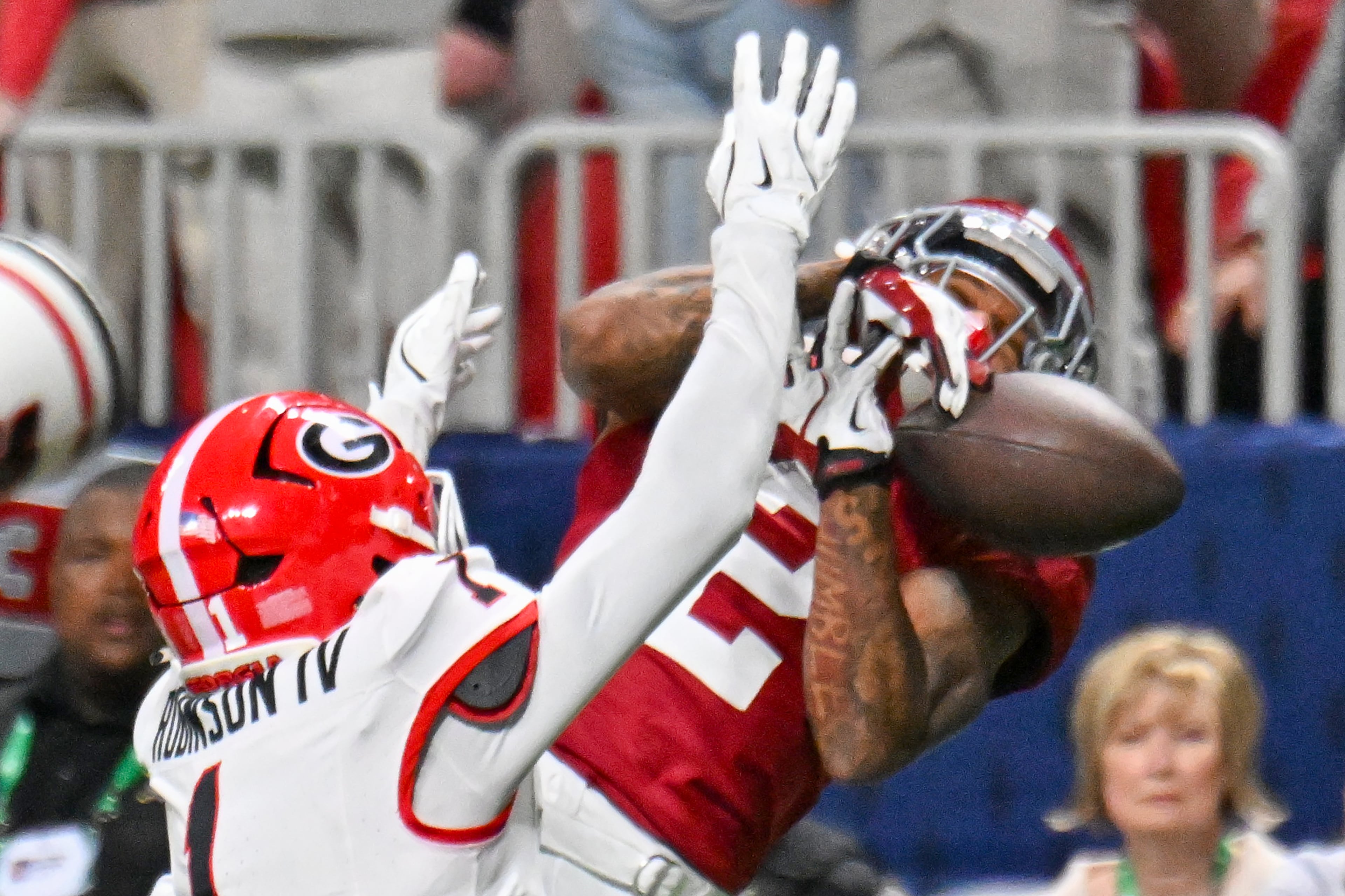 Alabama wide receiver Ryan Williams (2) is unable to catch an intended touchdown pass under pressure from Georgia defensive back Ellis Robinson IV (1) during the fourth quarter of the SEC Championship game at Mercedes-Benz Stadium, Saturday, Dec. 6, 2025, in Atlanta. (Hyosub Shin / AJC)