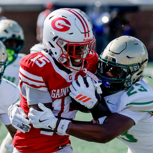 Gainesville’s Legend Wilmont (left) runs against Buford’s DJ Ford during their game on Saturday, Aug. 22, 2026, in Buford. Blue-chip prospects and lesser-knowns from both teams became gamechangers before a national audience. (Erik S. Lesser for the AJC)