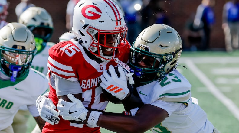 Gainesville’s Legend Wilmont (left) runs against Buford’s DJ Ford during their game on Saturday, Aug. 22, 2026, in Buford. Blue-chip prospects and lesser-knowns from both teams became gamechangers before a national audience. (Erik S. Lesser for the AJC)