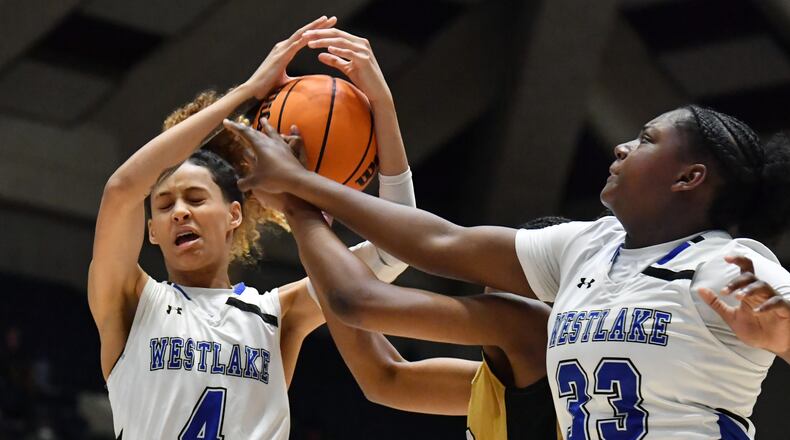 March 12, 2021 Macon - Westlake's Brianna Turnage (4) grabs a rebound during the 2021 GHSA State Basketball Class AAAAAA Girls Championship game at the Macon Centreplex in Macon on Friday, March 12, 2021 Westlake won 64-46 over Carrollton. (Hyosub Shin / Hyosub.Shin@ajc.com)