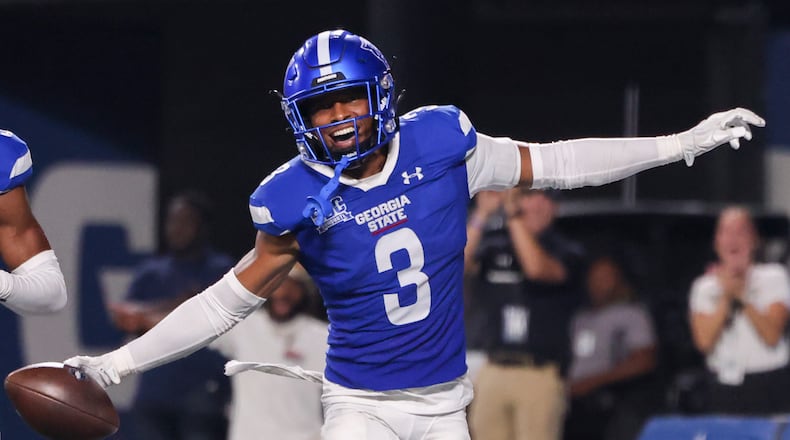 Georgia State defensive back Gavin Pringle (3) celebrates his interception returned 21-yards for a touchdown during the second half against Rhode Island at Center Parc Stadium, Thursday, August 31, 2023, in Atlanta. Georgia State won 42-35. (Jason Getz / Jason.Getz@ajc.com)