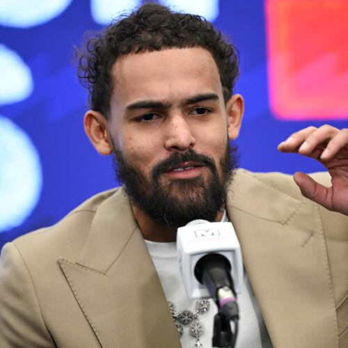 Washington Wizards newly acquired point guard Trae Young answers a question at news conference before an NBA basketball game against the New Orleans Pelicans, Friday, Jan. 9, 2026, in Washington. (AP Photo/John McDonnell)