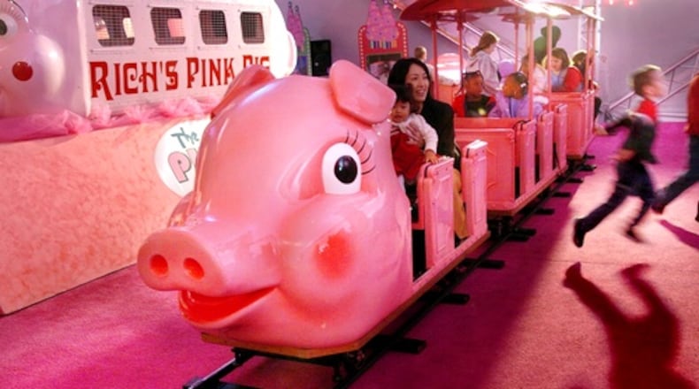 The Pink Pig, hosting a church group in this 2005 shot, delighted children from 1953 until 2019. (AJC file photo / Joey Ivansco)