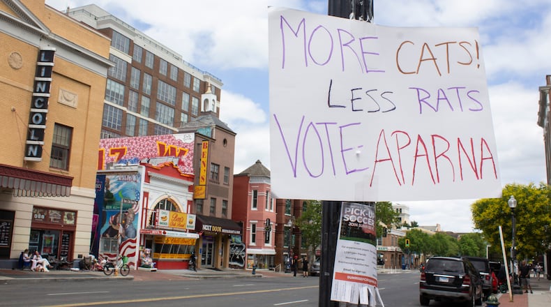 A hand-made campaign sign is posted outside the Lincoln Theatre and Ben’s Chili Bowl in the U Street Corridor of Washington, Sunday, June 7, 2026. (AP Photo/Tallulah Brown Van Zee)