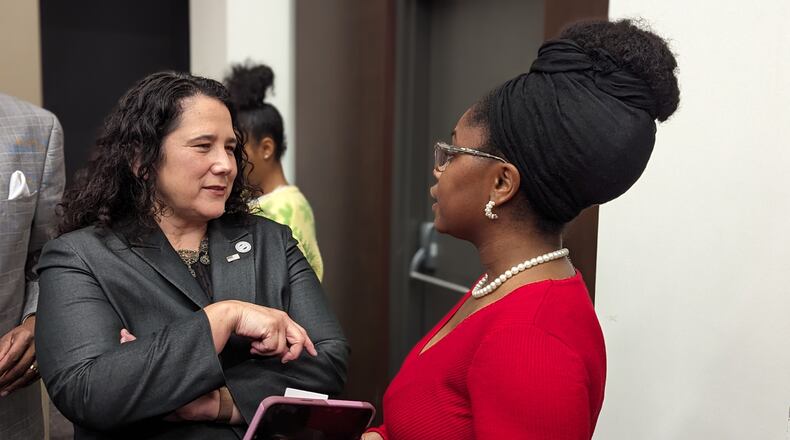 U.S. Small Business Administrator Isabel Casillas Guzman speaks with a Clark Atlanta student after a fireside chat at Clark Atlanta University on February 5, 2024.