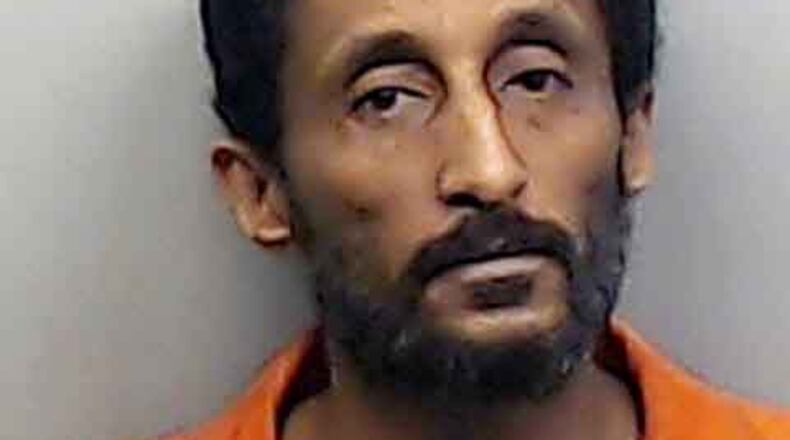 Amanuel Menghesha, 42, of Fairburn, was booked into the Fulton County jail Friday after spending more than two weeks in Grady Memorial Hospital. (Photo: Fulton County Sheriff’s Office)