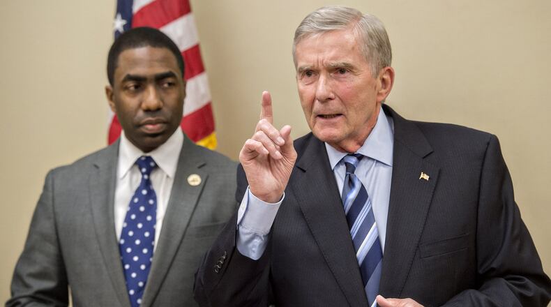 A fateful moment: Mike Bowers (right) appears with Lee May at a press conference in March. May said he was calling in Bowers to investigate corruption in DeKalb County. May said at the time: “I think Mike would throw me in jail if he thinks I’m doing something wrong.” Jonathan Phillips / For the AJC