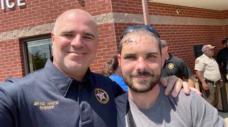 Lamar County Deputy Justyn Weaver (right) was released from the hospital Thursday, the sheriff's office said.