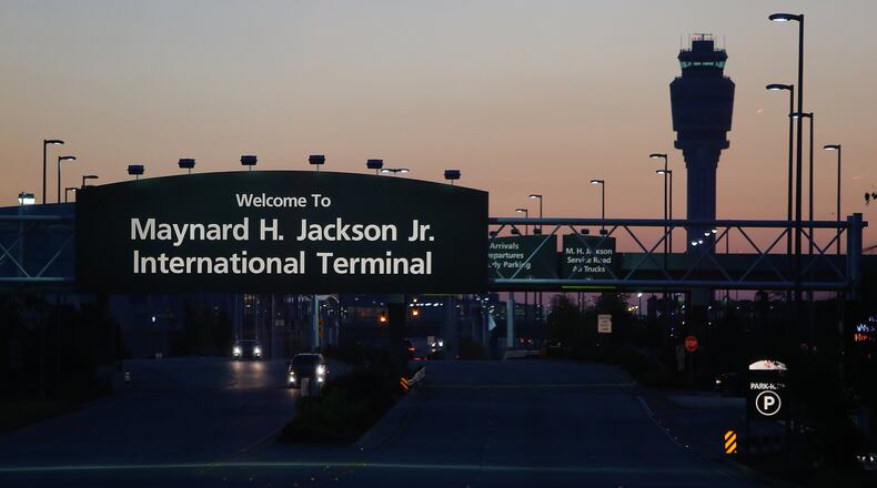 The pace begins to slow as dusk falls over Hartsfield Jackson Atlanta International Airport seen from the International Terminal side on Tuesday, Oct. 1, 2013, in Atlanta. CURTIS COMPTON / CCOMPTON@AJC.COM