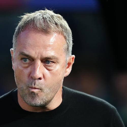 Barcelona head coach Hansi Flick stands by the touchline before the Spanish La Liga soccer match between FC Barcelona and Real Madrid in Barcelona, Spain, Sunday, May 10, 2026. (AP Photo/Joan Mateu Parra)