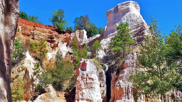 Naturally sculpted sand formations and various soil colors help make Providence Canyon State Park one of the state's most beautiful places. 
Courtesy of Charles Seabrook 
