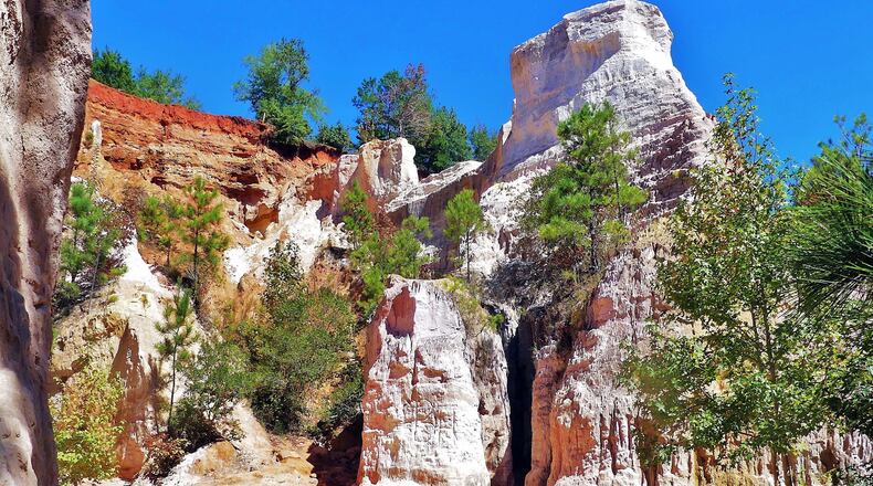 Naturally sculpted sand formations and various soil colors help make Providence Canyon State Park — Georgia's "Little Grand Canyon" — one of the state's most beautiful places. October is a great time to visit Georgia's state parks. Charles Seabrook for The Atlanta Journal-Constitution