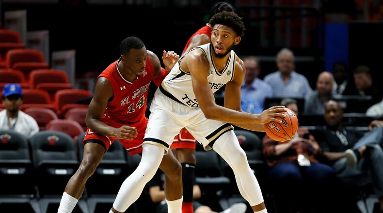 MIAMI, FL - DECEMBER 01: James Banks III #1 of the Georgia Tech Yellow Jackets is defended by Mustapha Heron #14 of the St. John's Red Storm during the first half of the HoopHall Miami Invitational at American Airlines Arena on December 1, 2018 in Miami, Florida. (Photo by Michael Reaves/Getty Images)