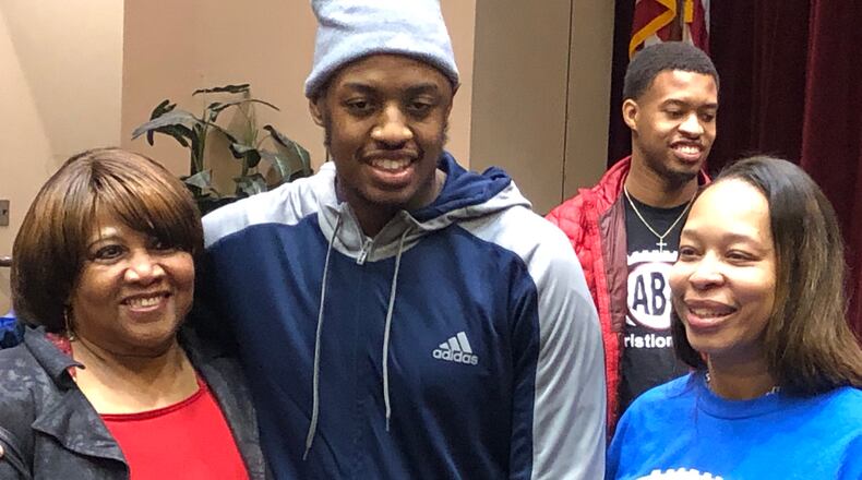 Tennessee State University football player Christion Abercrombie, who suffered a brain injury in a September game against Vanderbilty, completed an inpatient program at Atlanta’s Shepherd Center on Friday, about a month ahead of schedule, officials said. He was surrounded by relatives, including mother Staci Abercrombie (right).