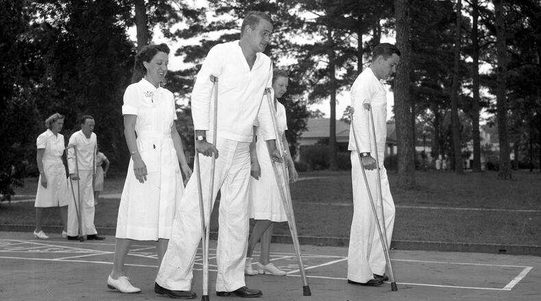 Patients learning to walk at the Roosevelt Warm Springs (GA) Institute for Rehabilitation, 1945 (AJC/File)