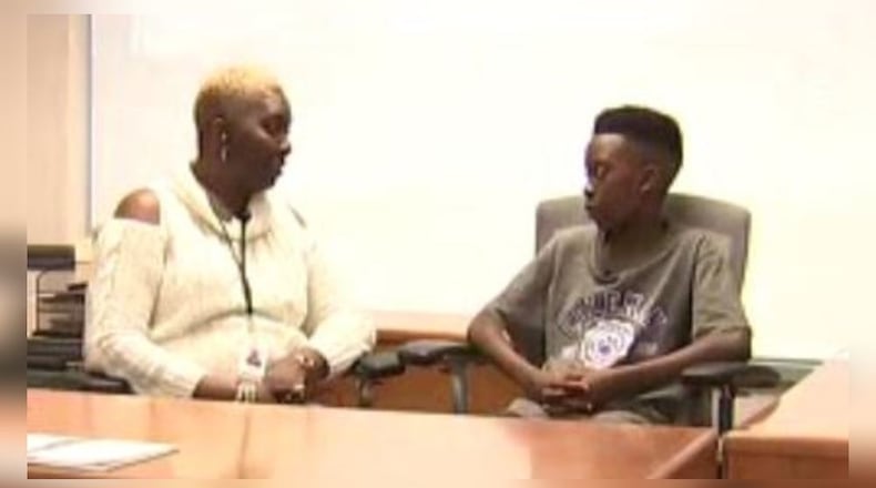 Angela Nichols (left) and her son Lyndon are upset about a school assignment in Gwinnett County.