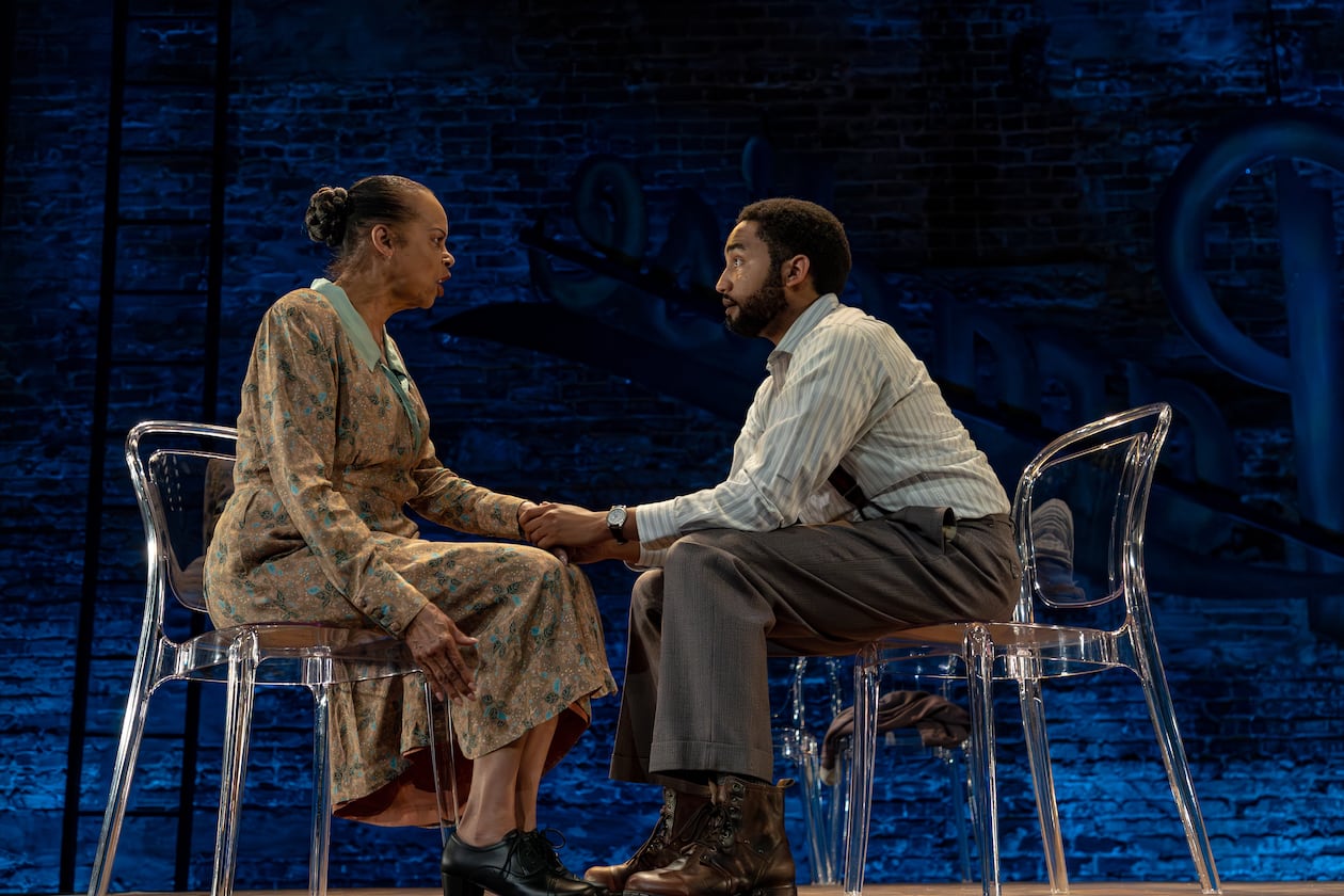 Terry Burrell as Amanda, shown here with her son, Tom (played by Stephen Ruffin), gives a mesmerizing performance as the unstable matriarch in “The Glass Menagerie” at Theatrical Outfit in Atlanta. (Courtesy of Casey Gardner Ford)