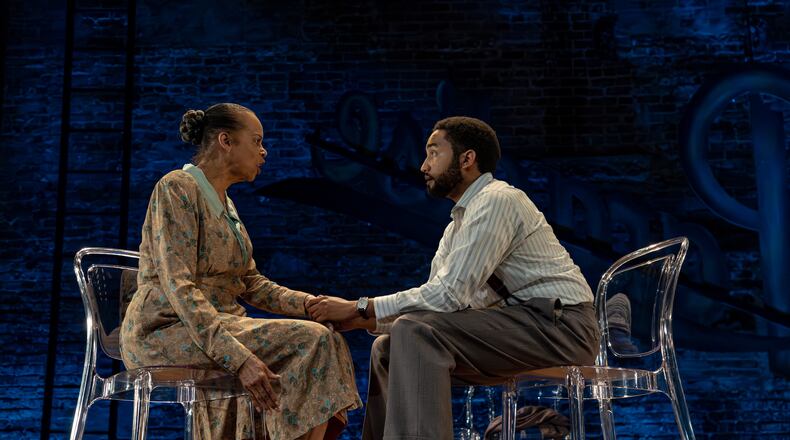 Terry Burrell as Amanda, shown here with her son, Tom (played by Stephen Ruffin), gives a mesmerizing performance as the unstable matriarch in “The Glass Menagerie” at Theatrical Outfit in Atlanta. (Courtesy of Casey Gardner Ford)