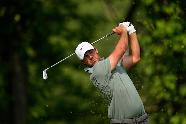 Brooks Koepka tees off on the 13th hole during the first round of the U.S. Open golf tournament at Oakmont Country Club Thursday, June 12, 2025, in Oakmont, Pa. (AP Photo/Carolyn Kaster)