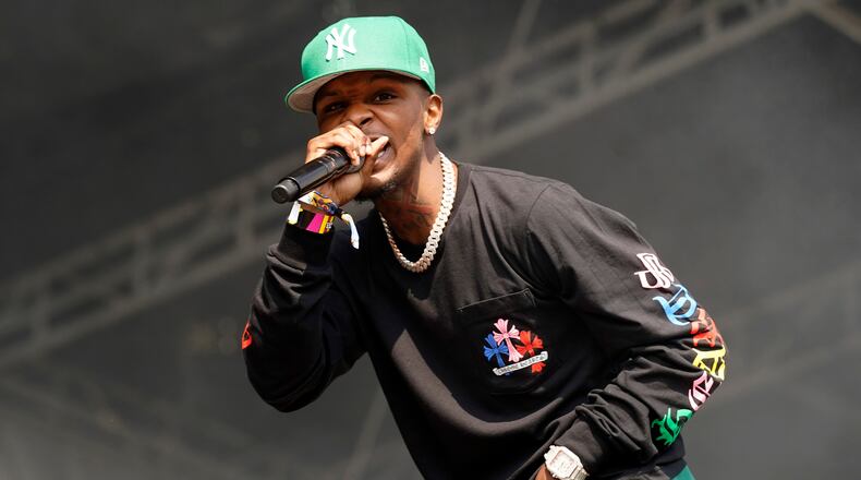 FILE - Toosii performs on day four of the Lollapalooza music festival in Chicago on Aug. 1, 2021. (Photo by Rob Grabowski/Invision/AP, File)