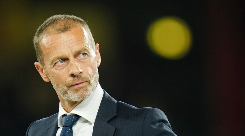UEFA President Aleksander Ceferin looks on during the trophy ceremony at the end of the UEFA Super Cup soccer match between Paris Saint-Germain and Aston Villa in Salzburg, Austria, Wednesday, Aug.12, 2026. (AP Photo/Darko Bandic)