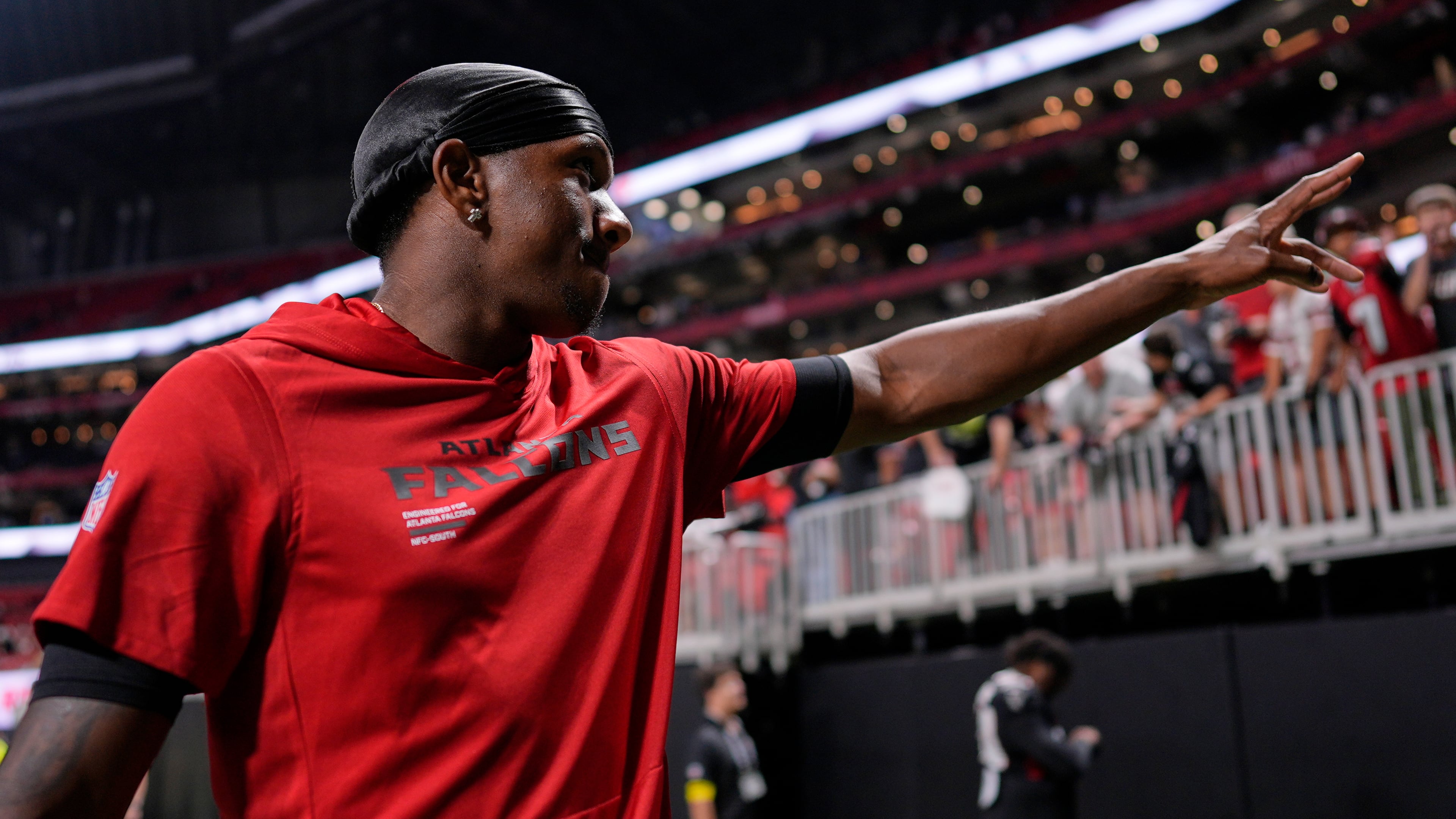 Atlanta Falcons quarterback Michael Penix Jr. waves to the crowd as he leaves the field after a preseason NFL football game against the Tennessee Titans, Friday, Aug. 15, 2025, in Atlanta. (Mike Stewart/AP)