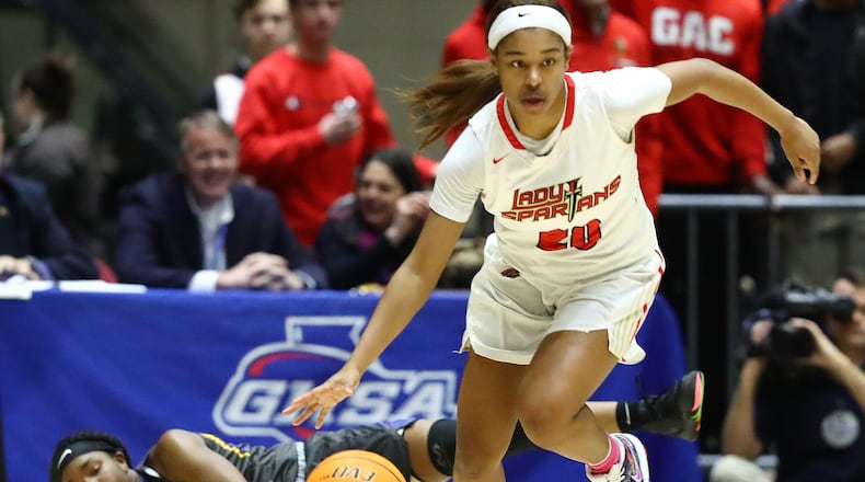 Greater Atlanta Christian defender Kaleigh Addie drives away after a steal during the Class AAA girls state basketball championship Thursday, March 5, 2020, in Macon.