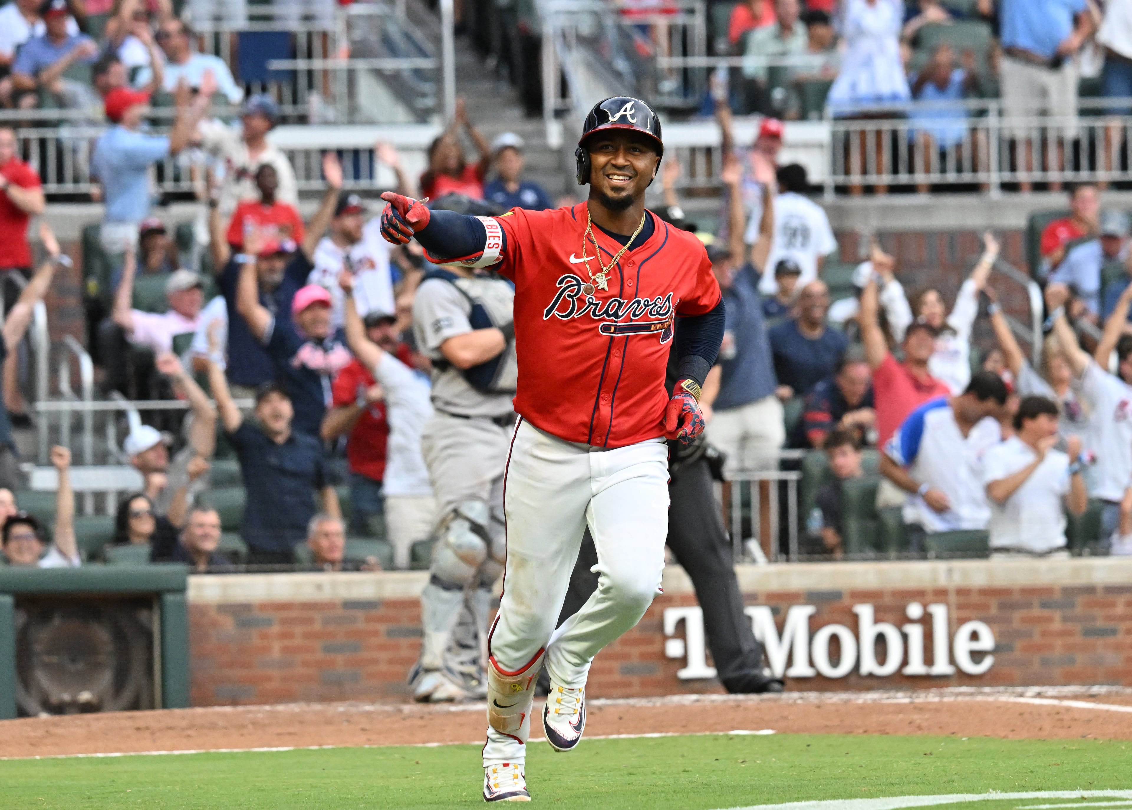 Braves second baseman Ozzie Albies hits a three-run home run during the third inning at Truist Park on Friday, July 18, 2025, in Atlanta. (Hyosub Shin/AJC)