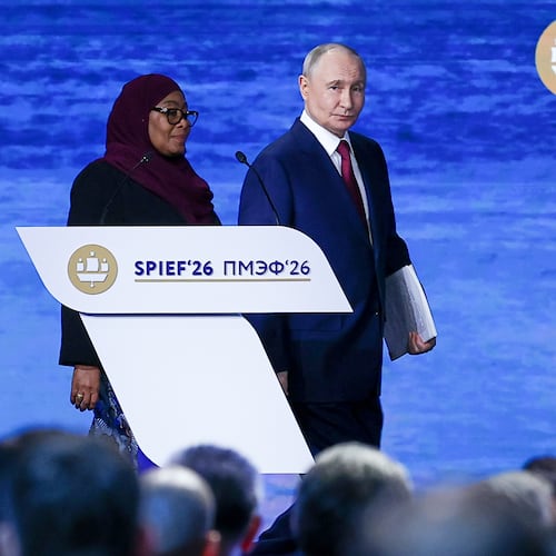 In this photo released by the Roscongress Foundation, Russian President Vladimir Putin, center, and Tanzanian President Samia Suluhu Hassan arrive to attend a plenary session at the St. Petersburg International Economic Forum in St. Petersburg, Russia, on Friday, June 5, 2026. (Vyacheslav Viktorov/Roscongress Foundation via AP)