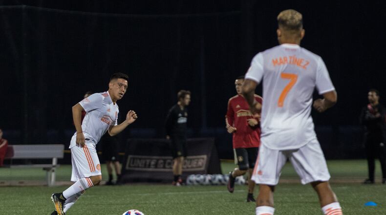 Atlanta United midfielder Ezequiel Barco, of Argentina, passes to forward Josef Martinez (7) during a training session at Children?s Healthcare of Atlanta Training Ground, Thursday, Feb. 15, 2018, in Marietta, Ga. BRANDEN CAMP/SPECIAL