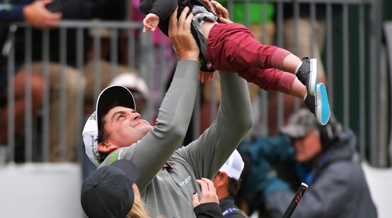Wheeeee: Logan, your dad Keegan Bradley just won the BMW Championship and an invitation to East Lake next week. (Drew Hallowell/Getty Images)