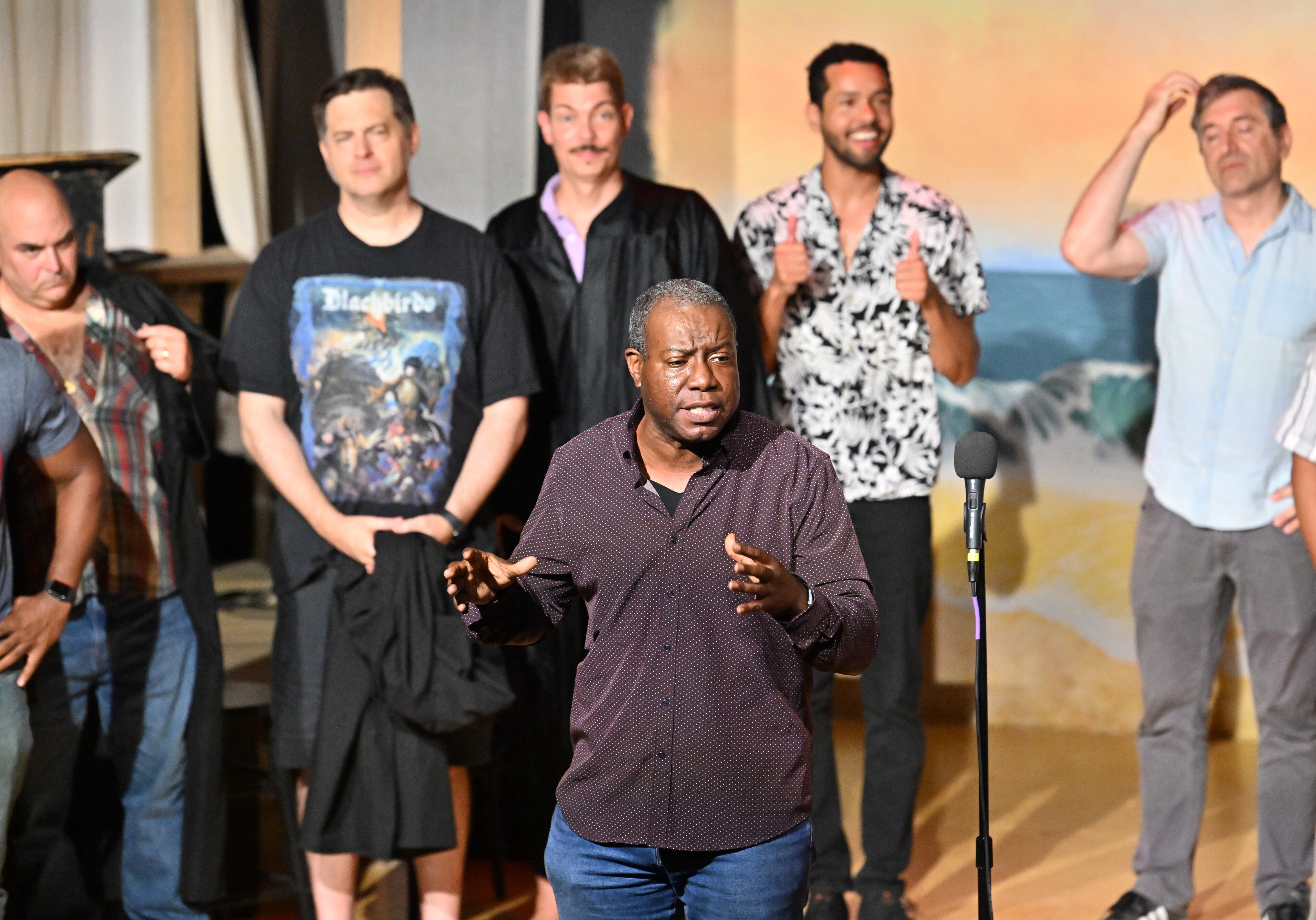 Jon Carr, the theatre company’s current co-artistic director and night’s show host, speaks to audience members during the "Dirty 30" festivities at Dad’s Garage on Friday, July 25, 2025, in Atlanta. (Hyosub Shin/AJC)