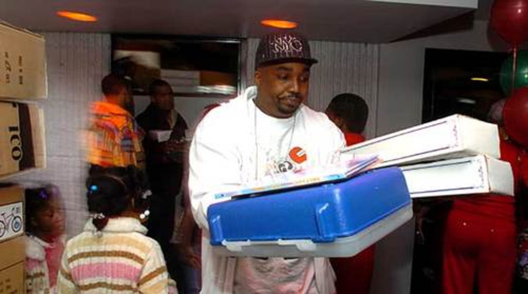 Friends, family turn out for T.I. Christmas