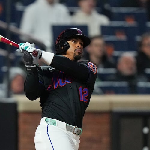 New York Mets' Francisco Lindor follows through on a three-run home run during the third inning of a baseball game against the Minnesota Twins Tuesday, April 21, 2026, in New York. (AP Photo/Frank Franklin II)