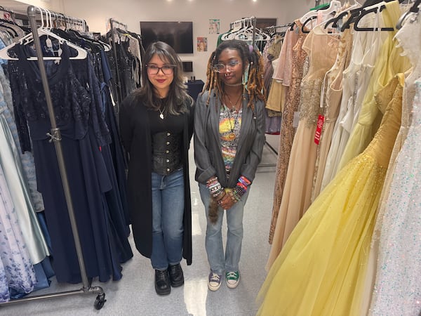North Springs students Alexa Tamariz and
Hailey Pugh look over the inventory at their school's first Prom Closet. Both bought deeply discounted items and were among the first customers when the closet opened about a month ago. (Courtesy)