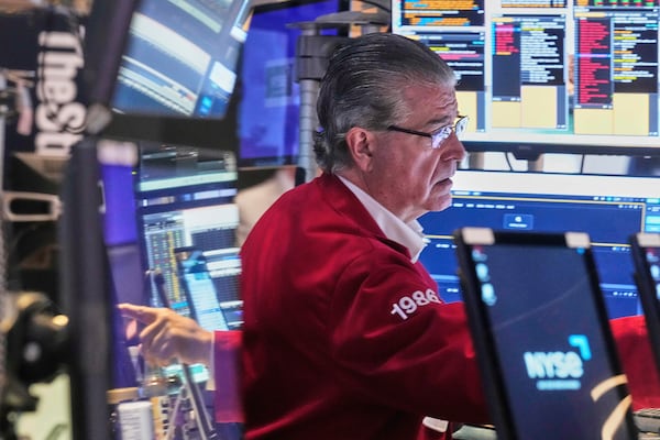 Trader Daniel Kryger works on the floor of the New York Stock Exchange, Tuesday, June 3, 2025. (AP Photo/Richard Drew)
