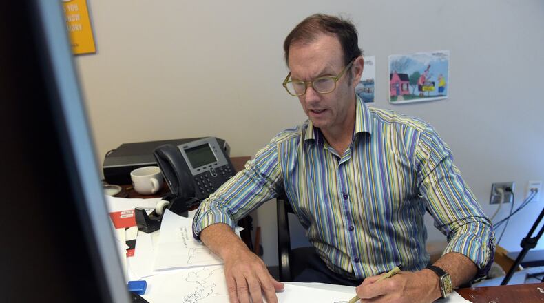 Atlanta Journal-Constitution editorial cartoonist Mike Luckovich told "Politically Georgia's" Bill Night that his goal is to "come up with something that shows people what’s actually happening or helps people in some way, stands up for people who don’t have much of a voice.” AJC FILE PHOTO 2017