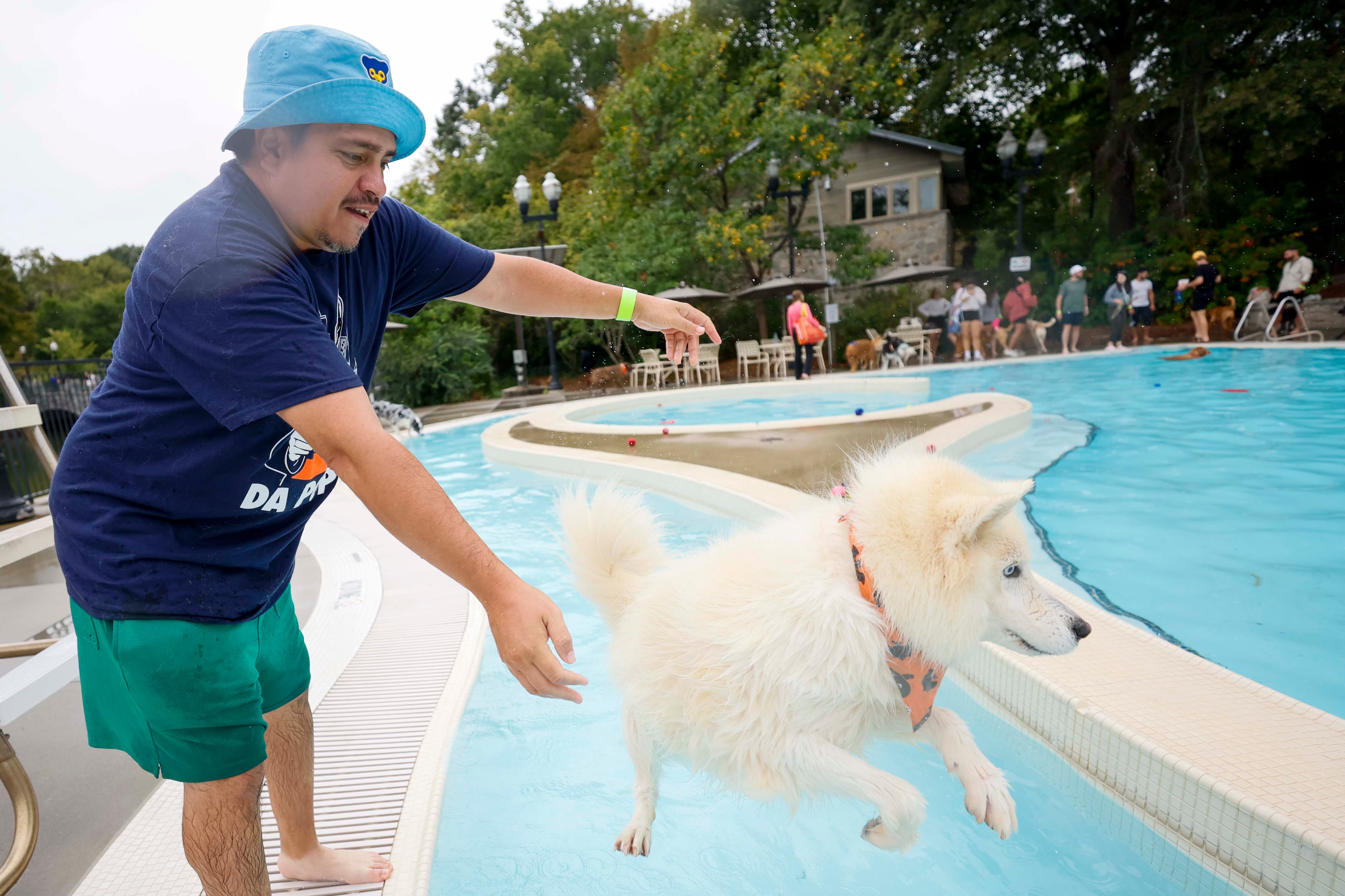 Chris Duran from Decatur tosses his dog Riley (5) into the water during the XV annual Splish Splash Doggie Bash at Piedmont Park on Sunday, October 5, 2025. The proceeds fund Piedmont Park Dog Parks.
(Miguel Martinez/ AJC)