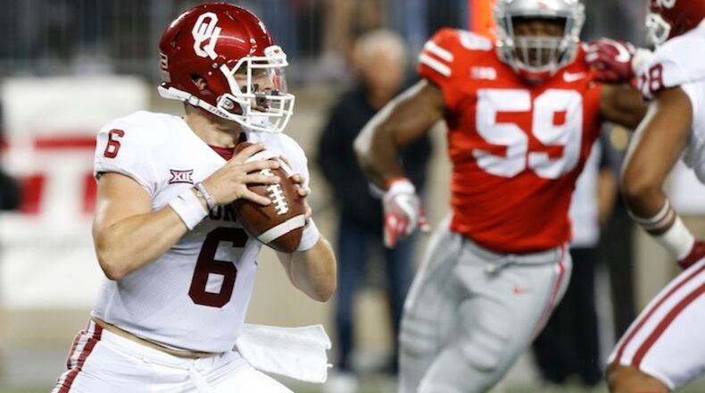Oklahoma quarterback Baker Mayfield plays against Ohio State during the first half of an NCAA college football game Saturday, Sept. 9, 2017, in Columbus, Ohio. (AP Photo/Jay LaPrete)
