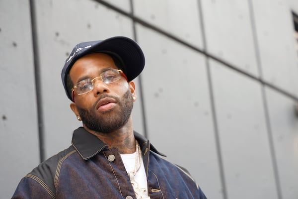 Atlanta rapper Hoodrich Pablo Juan poses Saturday, Nov. 29, 2025, outside of Center Stage before his first performance since his recent release from prison. (Akili-Casundria Ramsess, EyeAkili Media for The Atlanta Journal-Constitution)