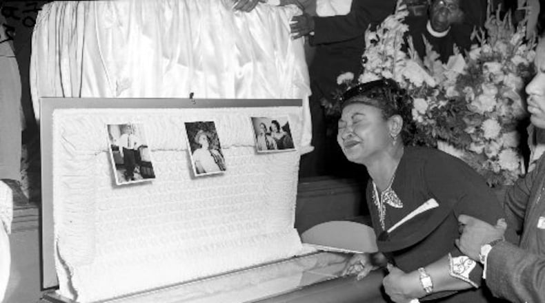 In this Sept. 6, 1955, photo, Mamie Till Mobley weeps at her son’s funeral in Chicago. Emmett Till was so badly beaten that his body was not recognizable. But his mother insisted on an open casket so the world could see the horrors of racism. (AP Photo/Chicago Sun-Times)